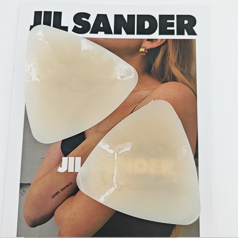 Reusable silicone nipple pasties, triangular adhesive, invisible coverage design, suitable for women's collarless tops.