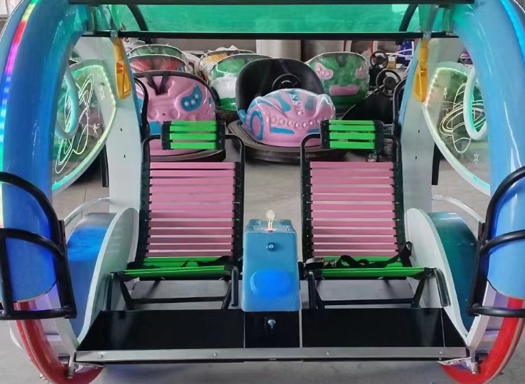 180-degree spin ride showing seat layout and standard safety belt