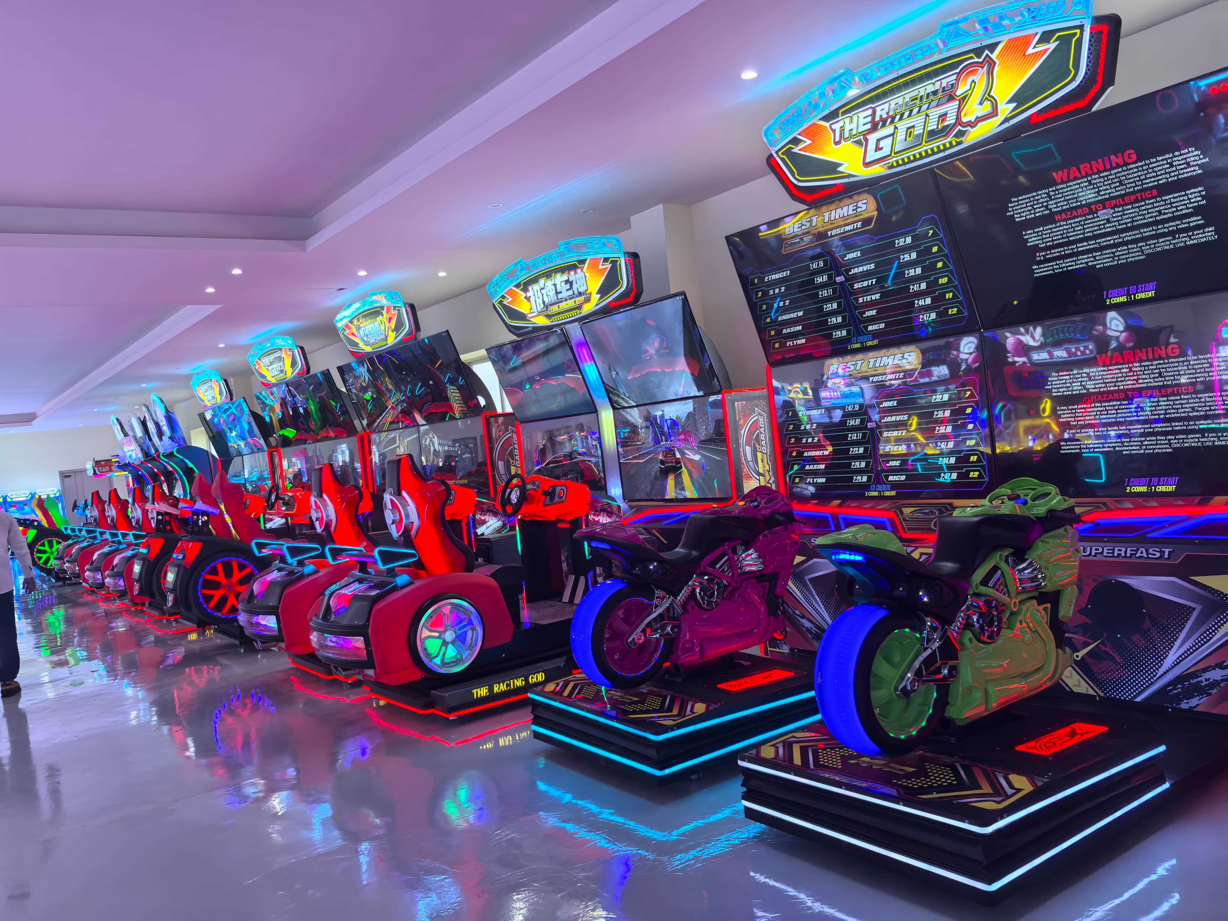 Racing arcade machines displayed in the exhibition hall