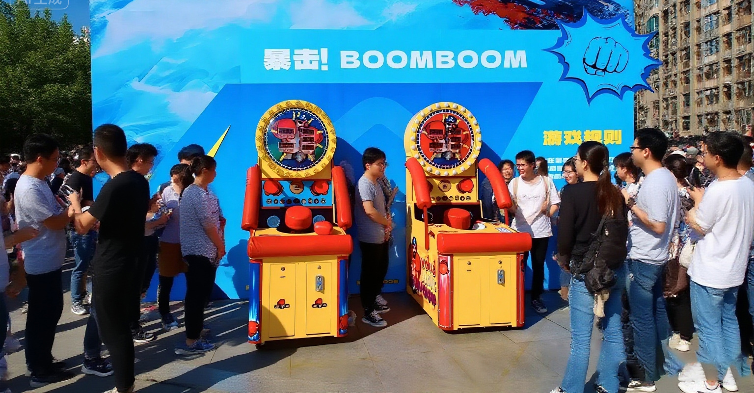 Crowd watching a boxing machine arcade game