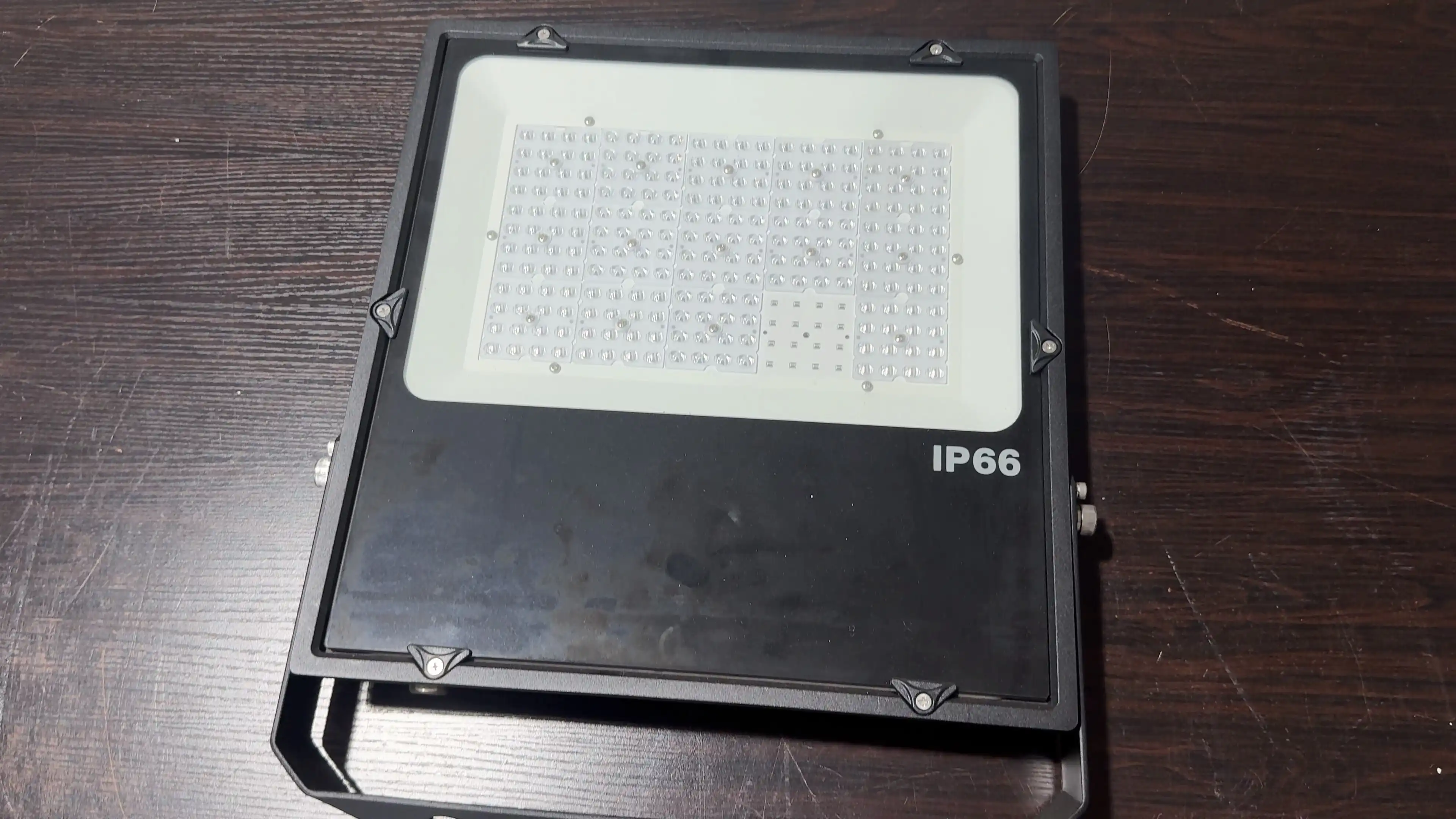 Rear view showing heavy-duty aluminum heatsink fins of 200W LED flood lamp