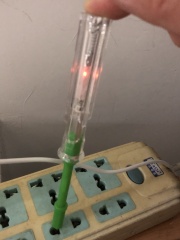Voltage test pen detects live wires and glows