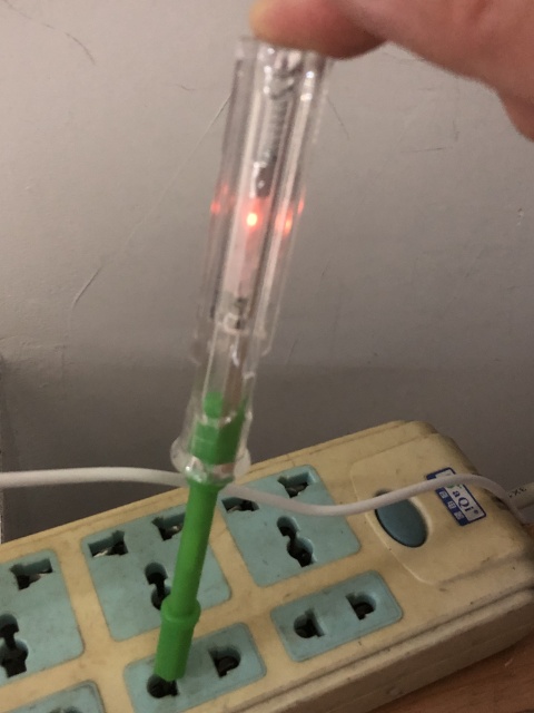 Voltage test pen detects live wires and glows