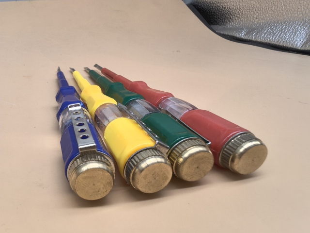 4 different colors of electrician's test pencil