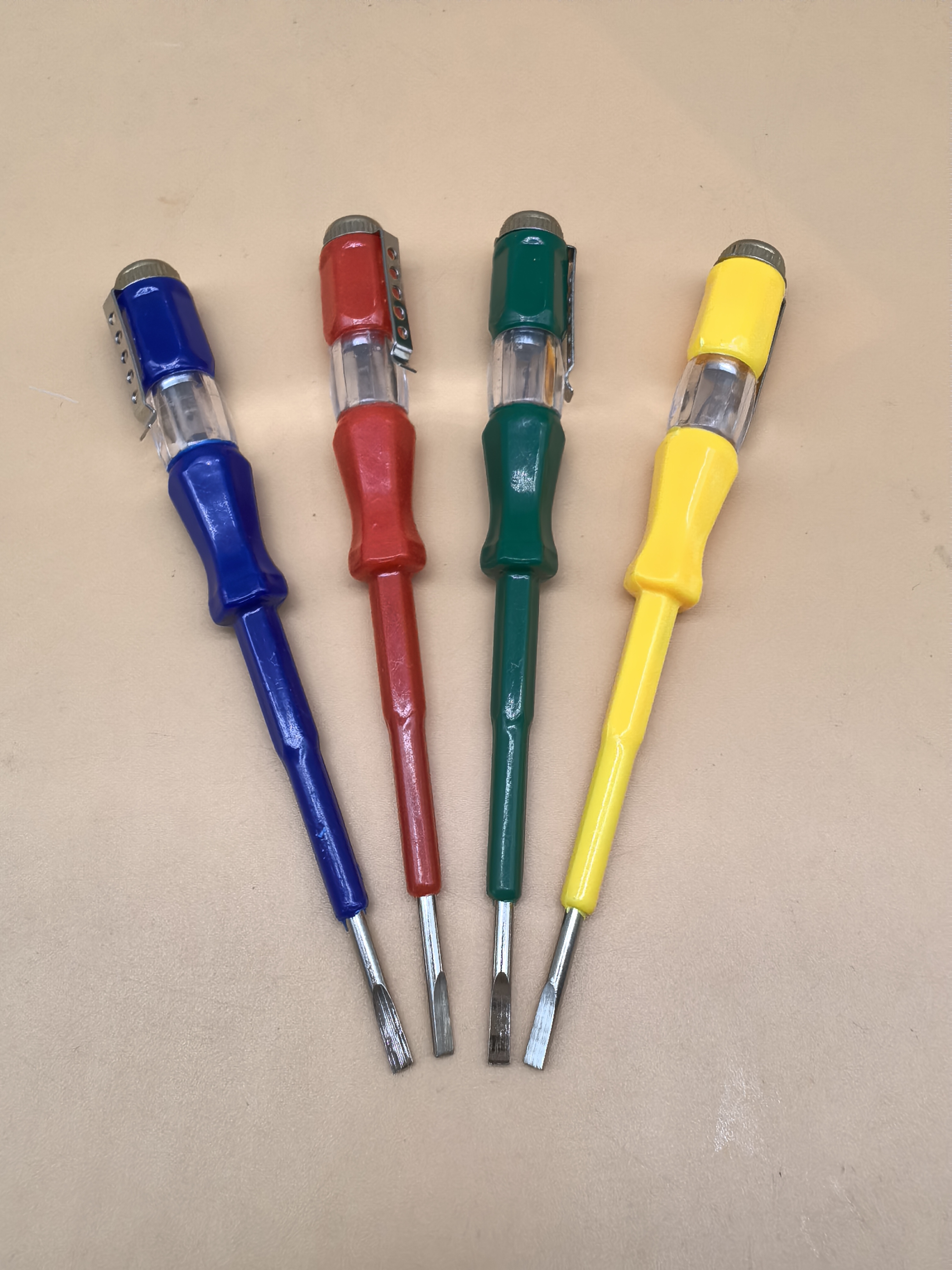 Ergonomic Grip‌ - The brightly colored handle provides a comfortable and slip-resistant grip for precise electrical testing