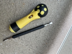 A ball-handled safety electrical test pen with a neon lamp and screwdriver function.