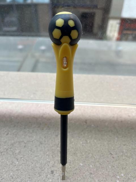 A ball-handled safety electrical test pen with a neon lamp and screwdriver function.