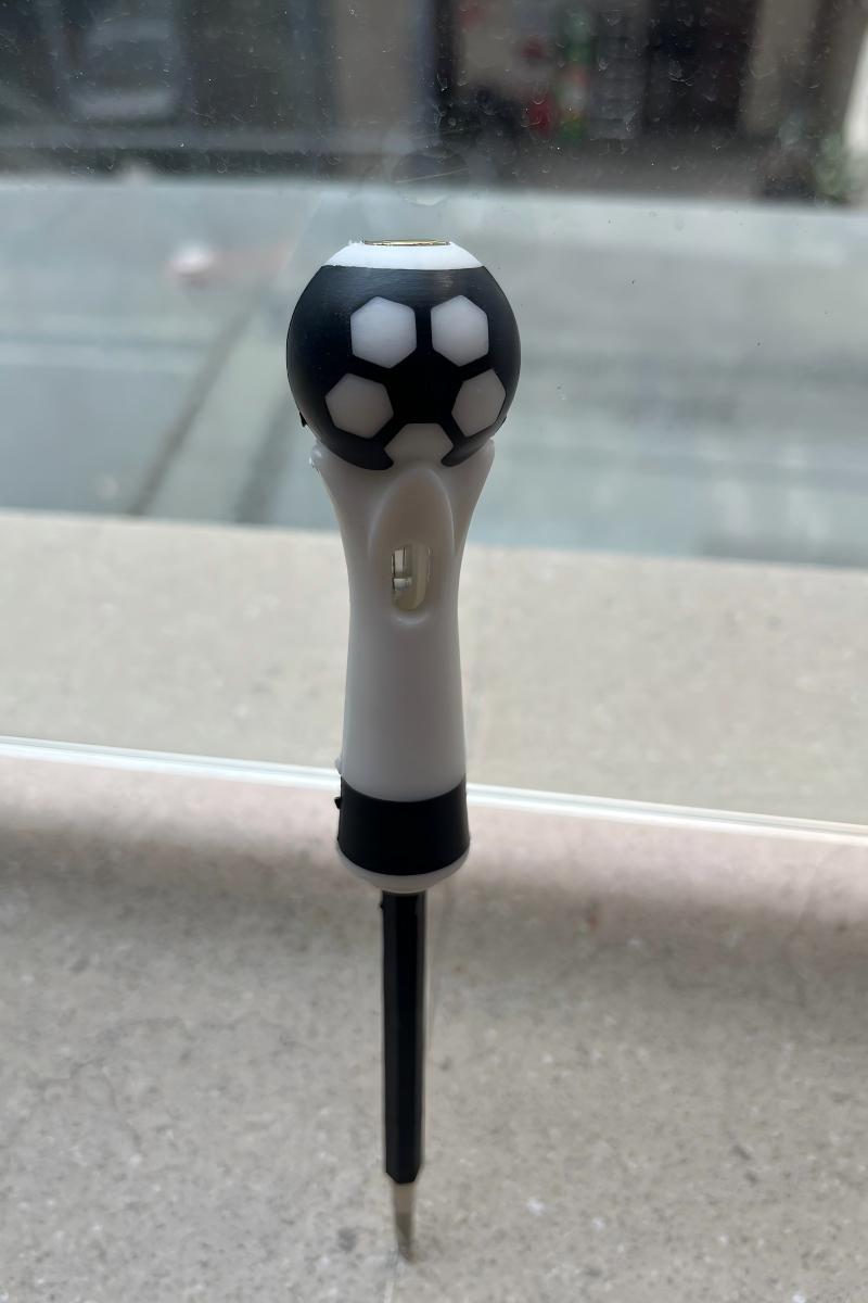 A ball-handled safety electrical test pen with a neon lamp and screwdriver function.