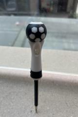 A ball-handled safety electrical test pen with a neon lamp and screwdriver function.