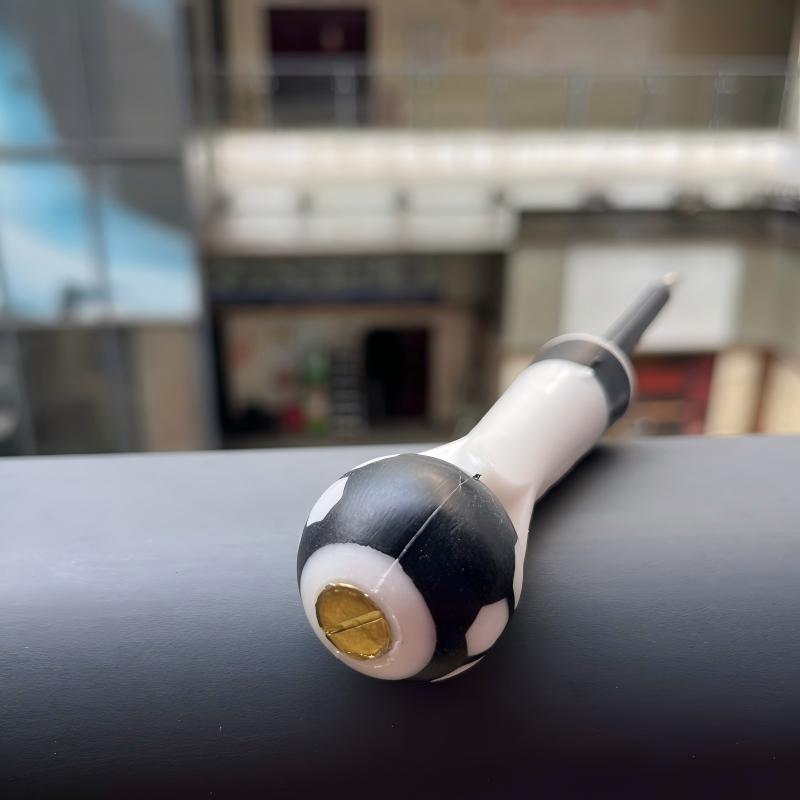 A ball-handled safety electrical test pen with a neon lamp and screwdriver function.