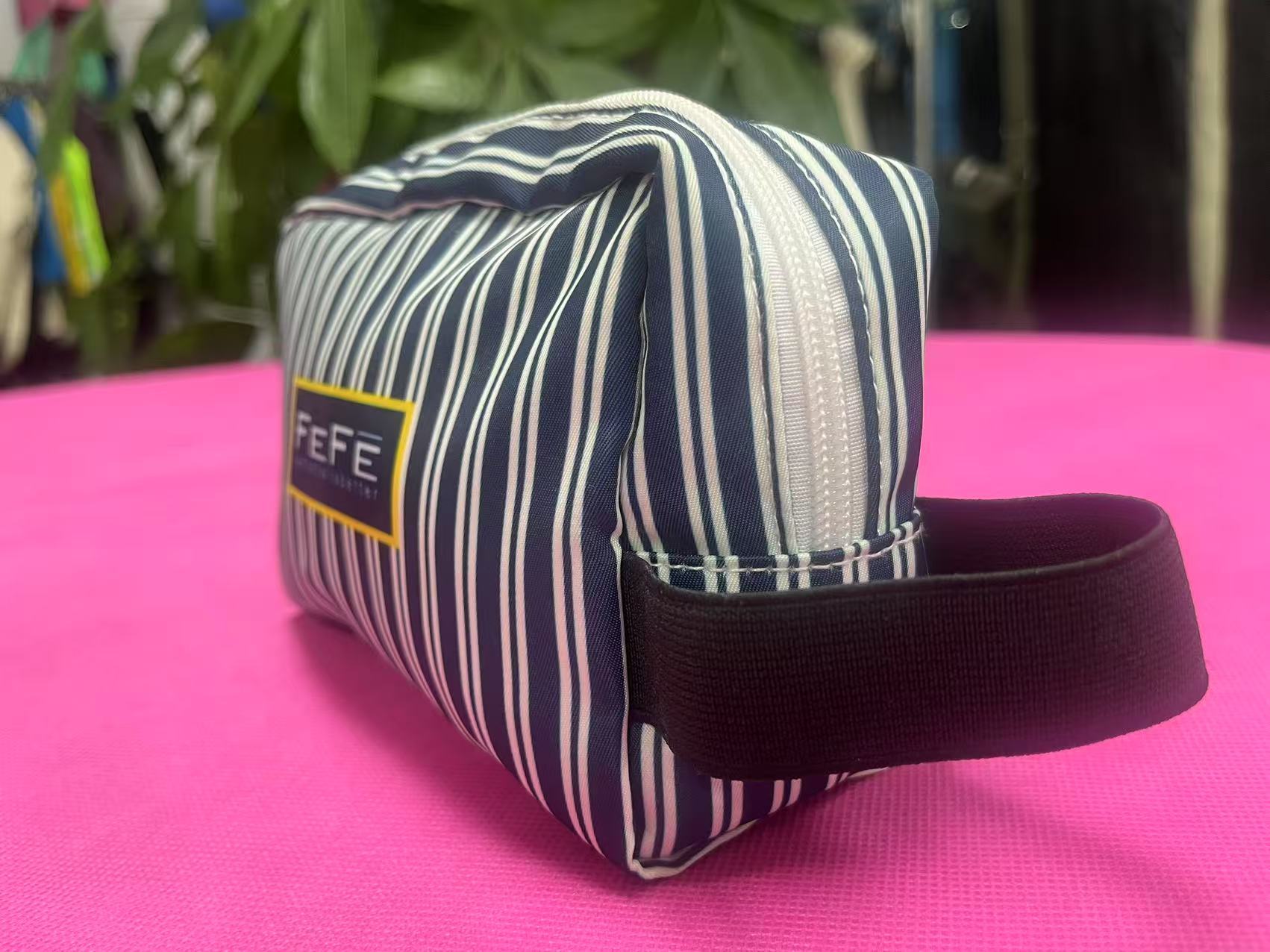 Striped cosmetic bag