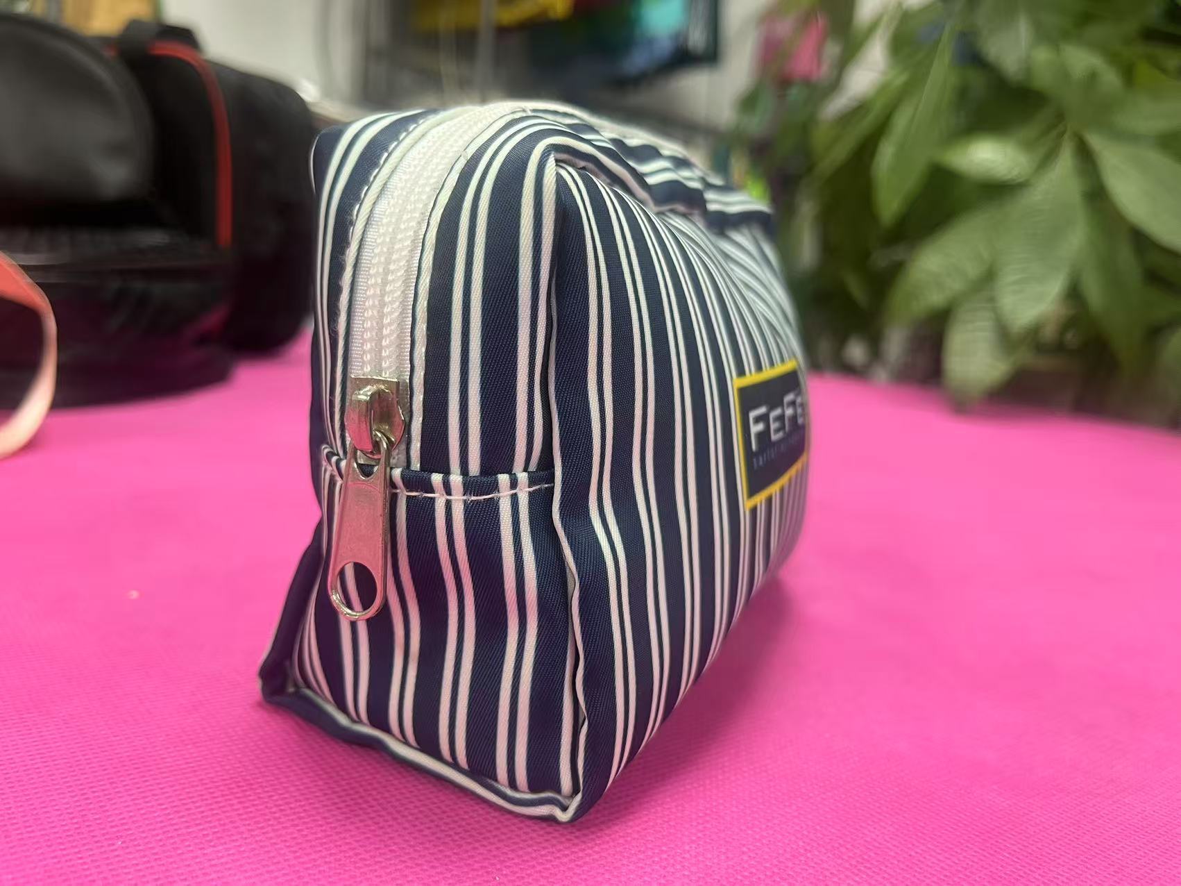 Striped cosmetic bag
