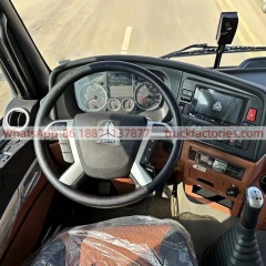 13.重汽豪沃后八轮长兴12吨4节臂短轴距随车起重卡车