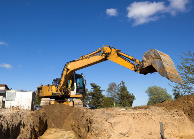 a mini excavator is ditching - How Much Does a Mini Excavator Cost