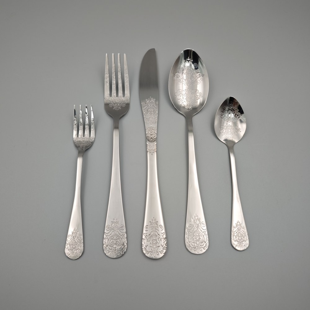 Silver - Toned Cutlery Set with Ornate Patterns - Elegant Tableware