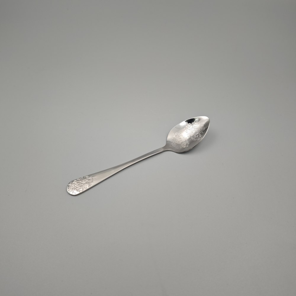 Silver - Toned Cutlery Set with Ornate Patterns - Elegant Tableware