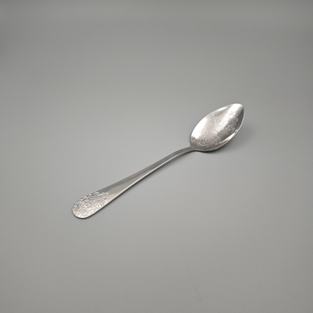 Silver - Toned Cutlery Set with Ornate Patterns - Elegant Tableware