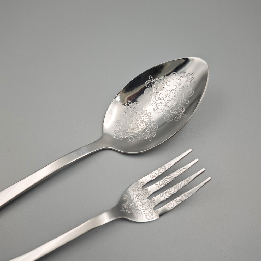 Silver - Toned Cutlery Set with Ornate Patterns - Elegant Tableware