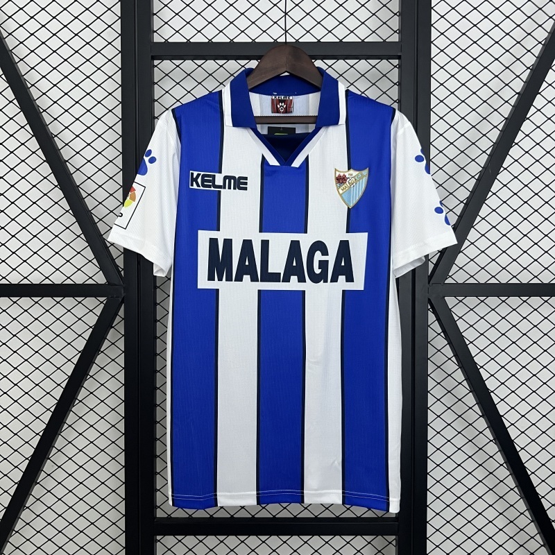 9899 Málaga Home retro Fan version