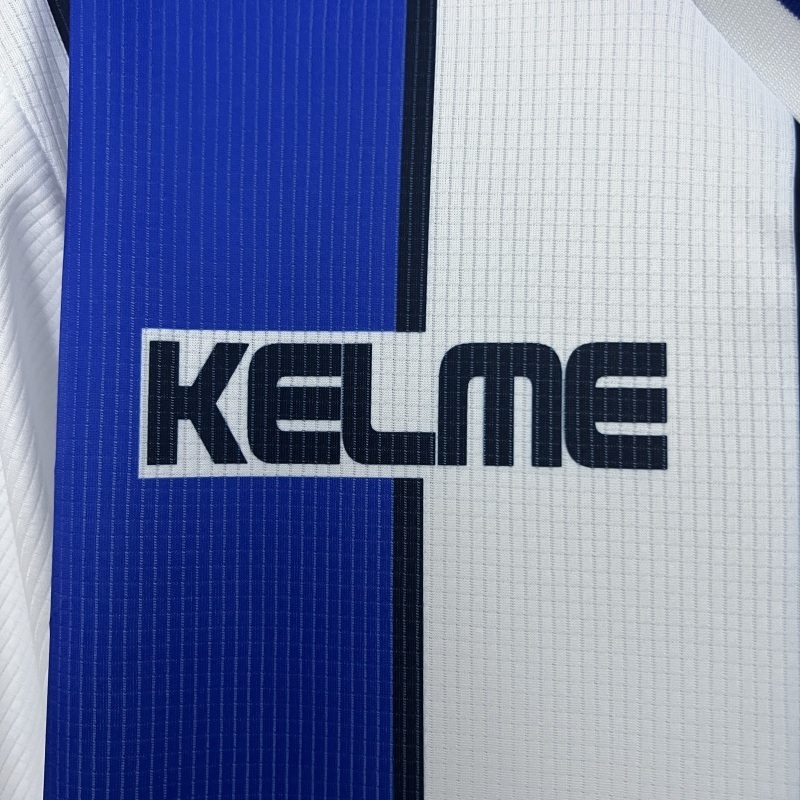 9899 Málaga Home retro Fan version