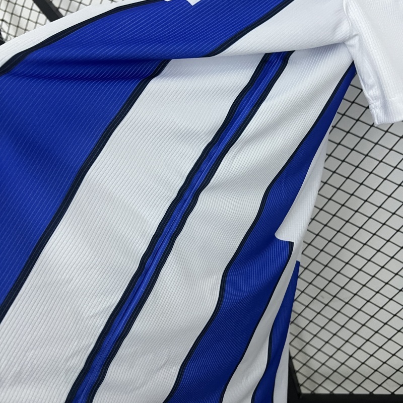9899 Málaga Home retro Fan version