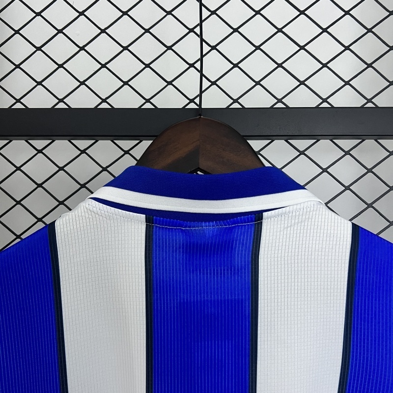 9899 Málaga Home retro Fan version