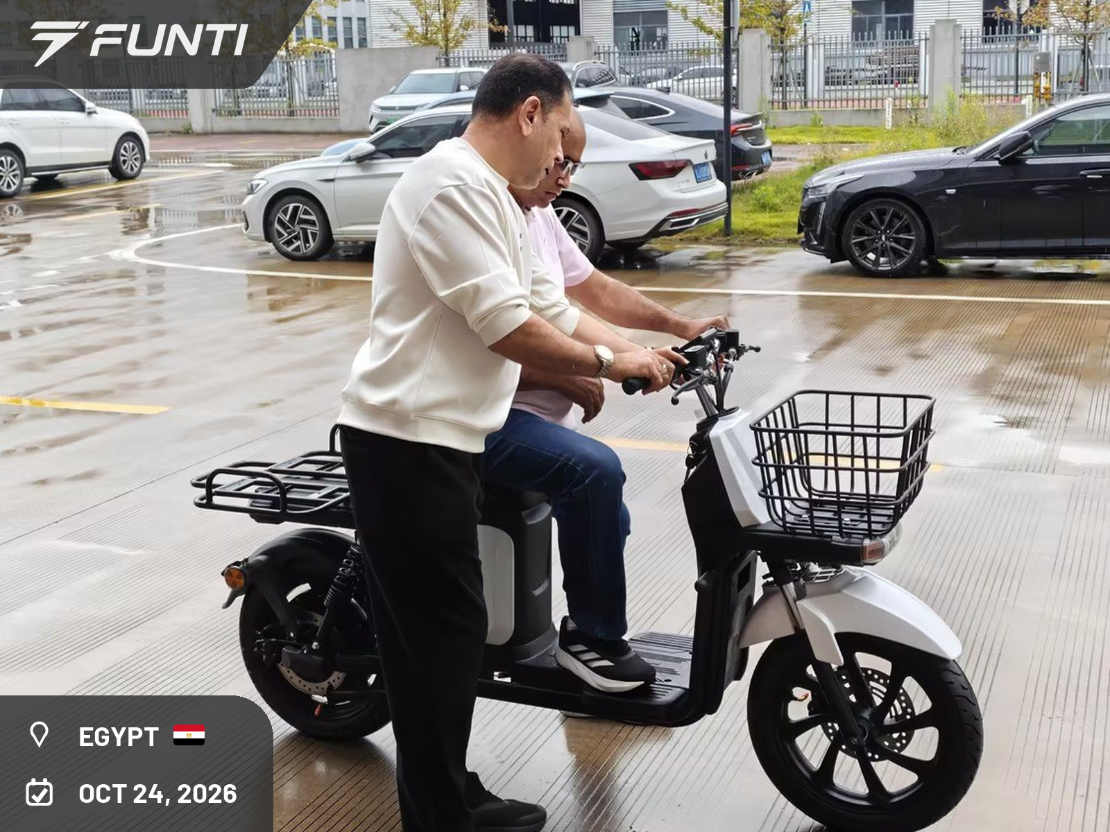 Two-up test ride of the FUNTI PACKY on the factory apron