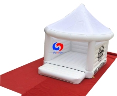 White inflatable wedding bouncer
