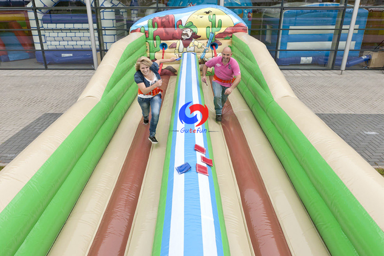 Sports club events western 33ft 10m dual lane horizontal air inflatable bungee run for sale