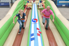 Sports club events western 33ft 10m dual lane horizontal air inflatable bungee run for sale