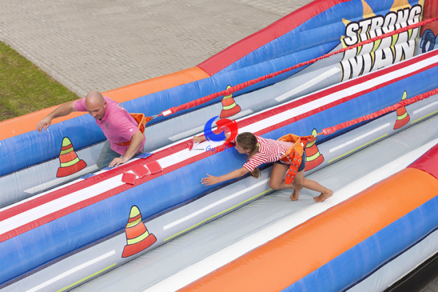 strongest man double lanes bungee games inflatable bungee run 2 lanes for sale