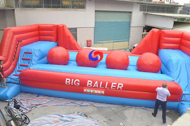interactive games inflatable obstacle course 4 huge red balls Leaps N Bounds Big Baller wipeout for kids adults