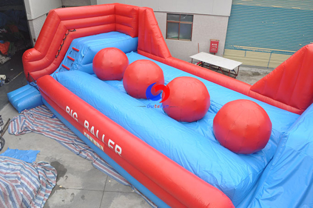 interactive games inflatable obstacle course 4 huge red balls Leaps N Bounds Big Baller wipeout for kids adults