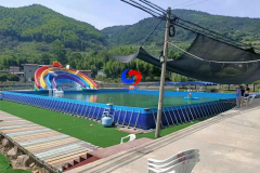 Commercial mobile water parks 30m*15m*1.5m steel metal frame above ground swimming pools with inflatable water slide