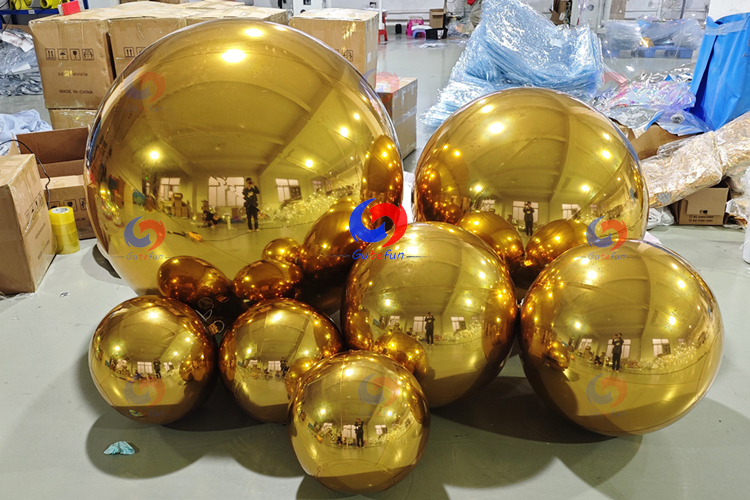 Bespoke balloon backdrop custom big shiny silver golden inflatable mirror balls for themed parties event decor planning