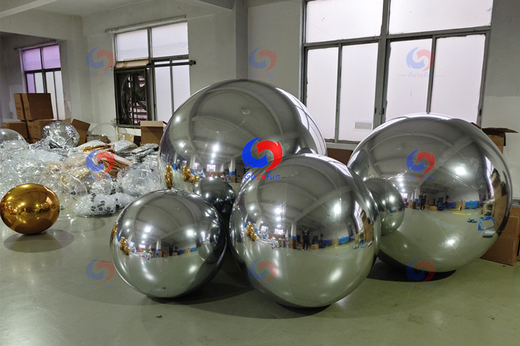 Bespoke balloon backdrop custom big shiny silver golden inflatable mirror balls for themed parties event decor planning