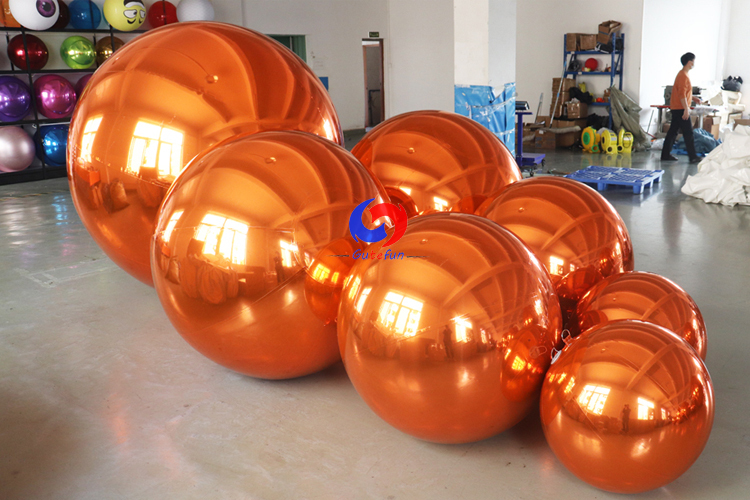 Birthday party events decorations big shiny balls dark orange inflatable mirror finish balls for sale
