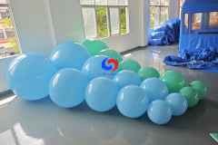 Aqua and baby blue giant inflatable balloons