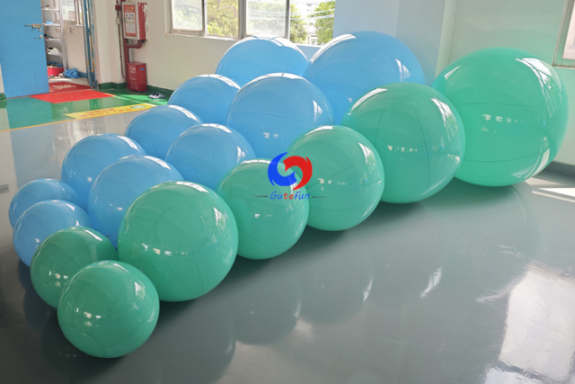 Aqua and baby blue giant inflatable balloons