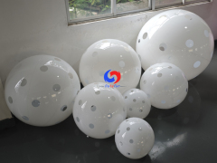 Clean white polka dot giant inflatable pickleballs in assorted mixed sizes, designed for all USA Pickleball events!