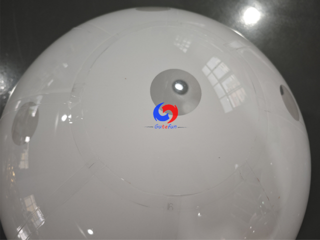 Clean white polka dot giant inflatable pickleballs in assorted mixed sizes, designed for all USA Pickleball events!