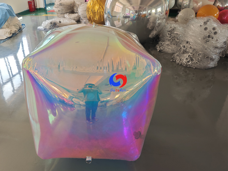 Matte frosted inflatable rounded cube with full‑surface subtle pearlescent iridescent tint