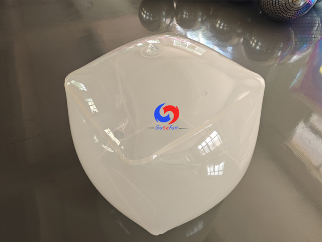 Matte frosted inflatable rounded cube with full‑surface subtle pearlescent iridescent tint