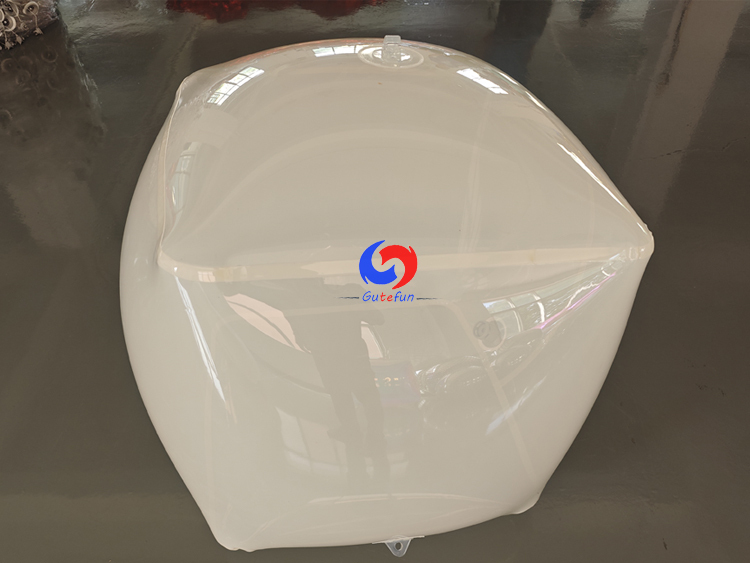 Matte frosted inflatable rounded cube with full‑surface subtle pearlescent iridescent tint