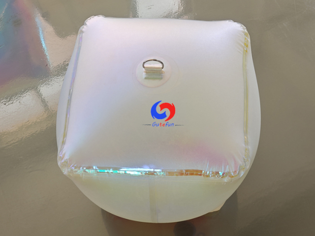 Matte frosted inflatable rounded cube with full‑surface subtle pearlescent iridescent tint