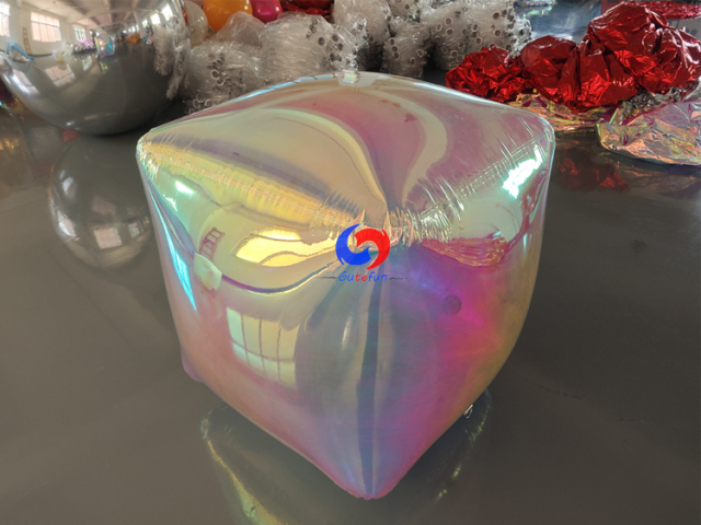 Matte frosted inflatable rounded cube with full‑surface subtle pearlescent iridescent tint