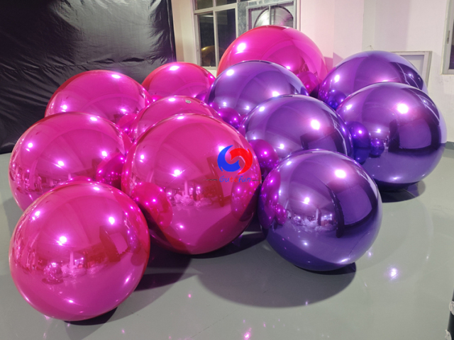 Modern wedding & brand launch events backdrop Stunning Silver & Black Inflatable Mirror Balls