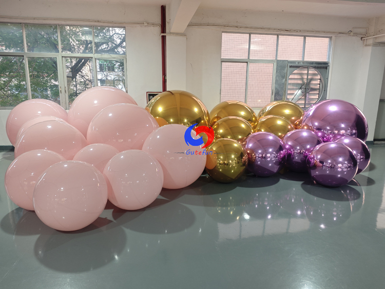 Matte Blush Pink, Metallic Gold & Metallic Purple inflatable decorative spheres for event installations