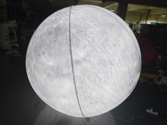 Giant LED inflatable moon ball realistic crater texture glowing white sphere for commercial event mall wedding installation