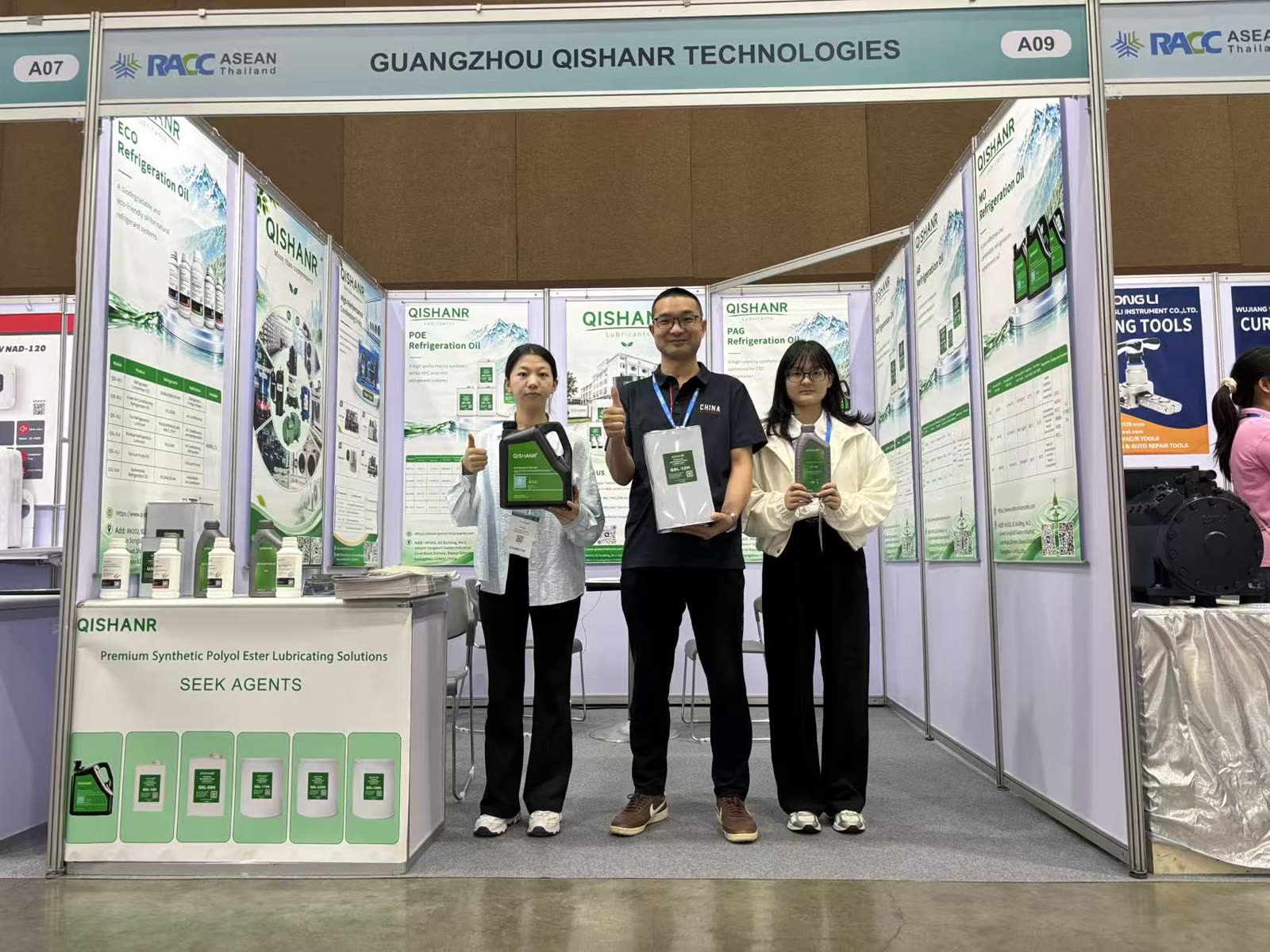 Qishanr Technical and Sales Team with displayed refrigeration oil products at Booth A09